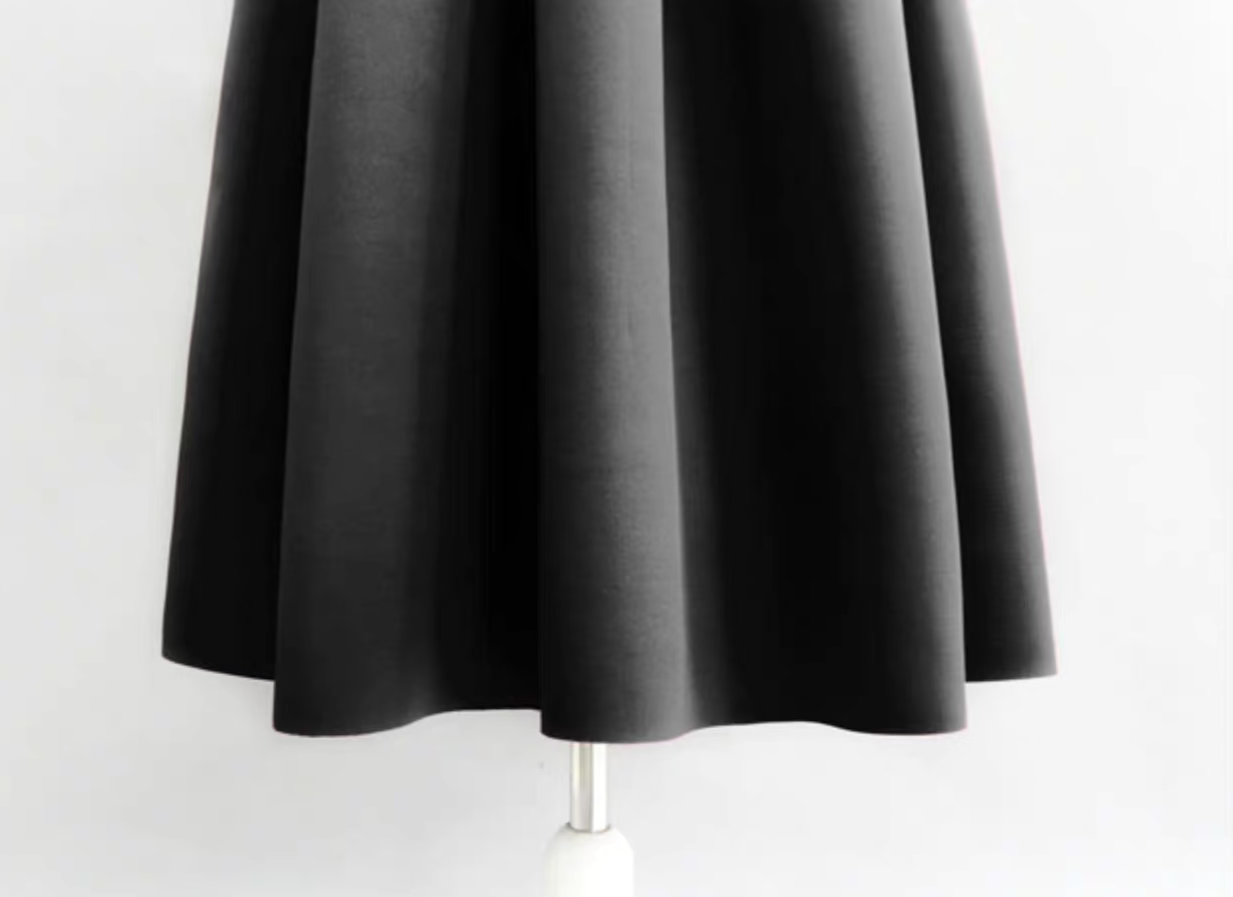 black slimming micro-puff skirt