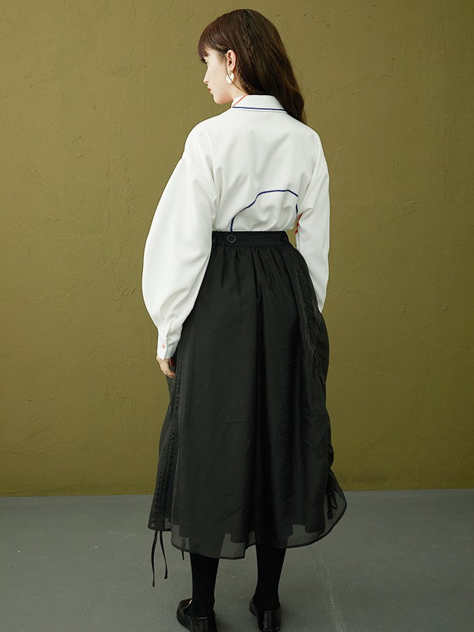 橙の落書きブラウス