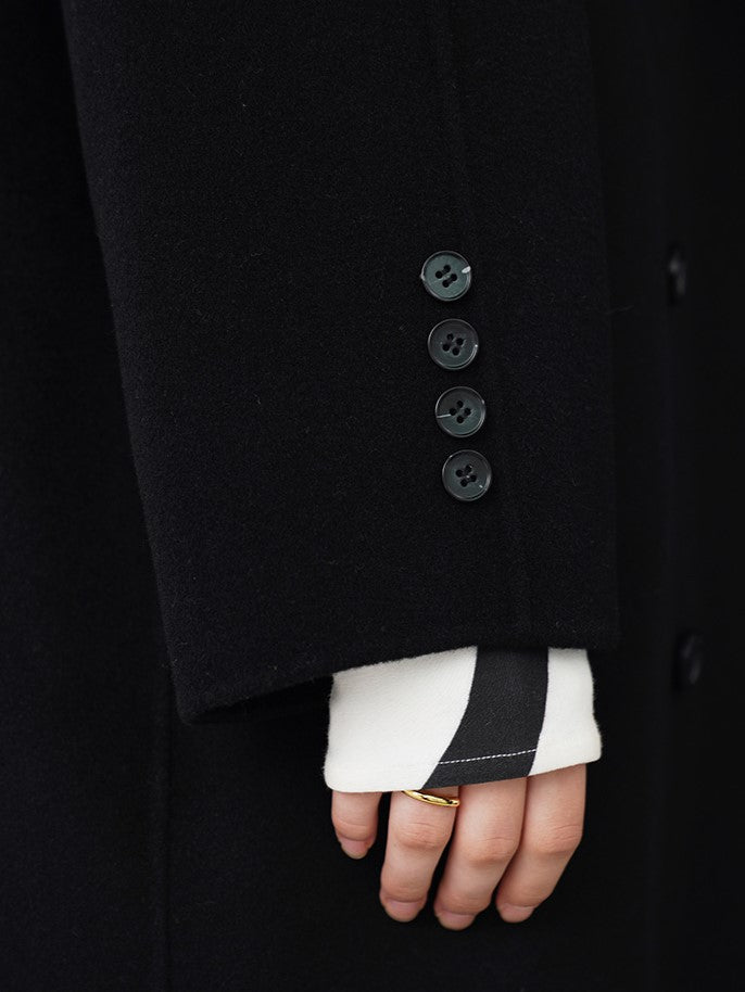 黒い眼の刺繍ロングコート