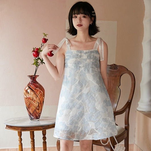 http://remulia.shop/cdn/shop/products/blue-white-camisole-vest-bows-cord-tie-dress-140933.jpg?v=1703410409