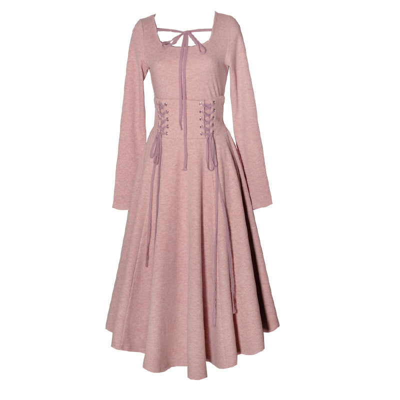 桜色の薔薇のスリムニットトップスとコルセットニットスカート