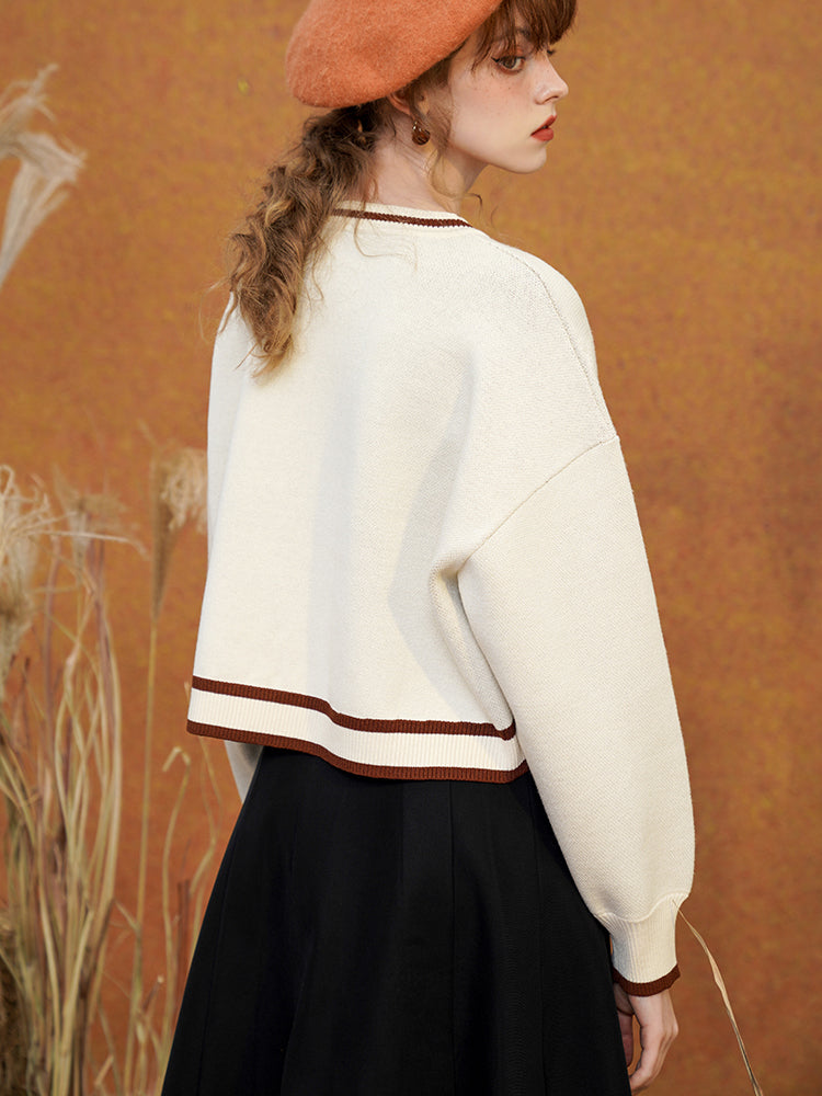 樹上に留まる豹のニットスウェット