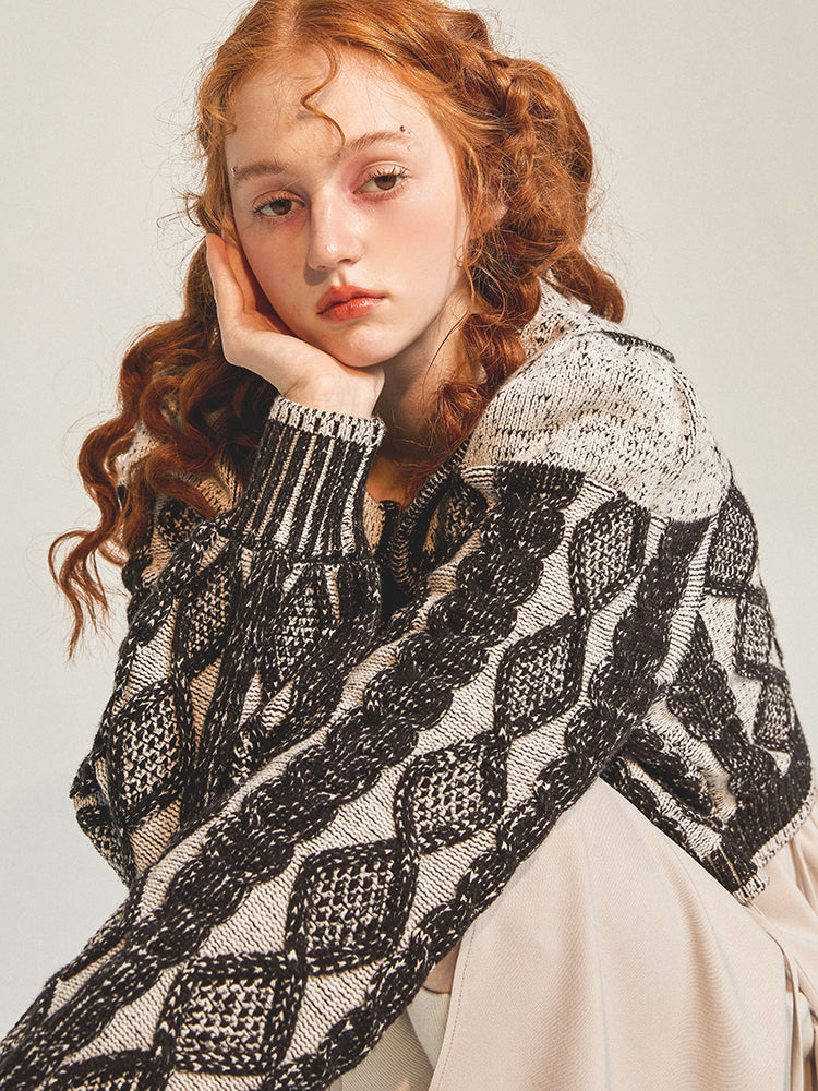 黒墨の幾何学柄ニットカーディガン