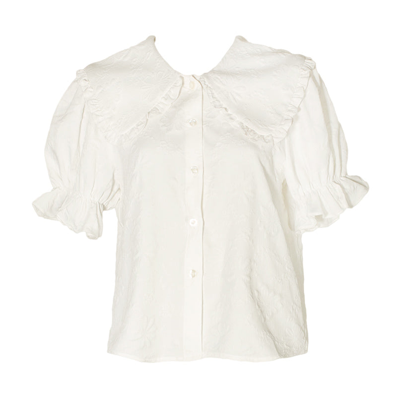 純白の花柄ジャガードブラウス