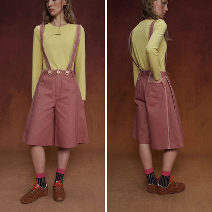 煉瓦色の刺繍ストラップパンツ