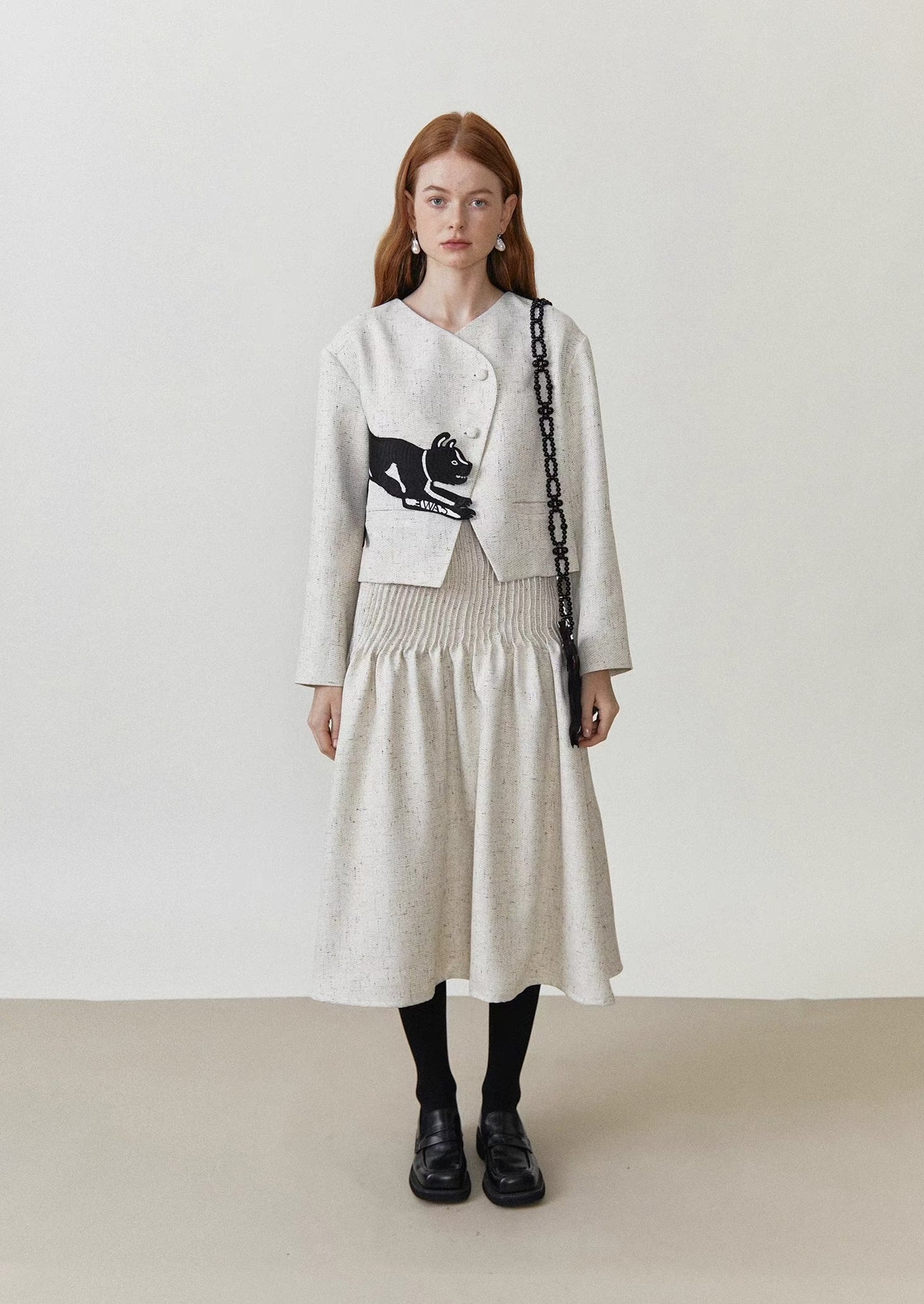 accordion pleated tweed mid-length skirt