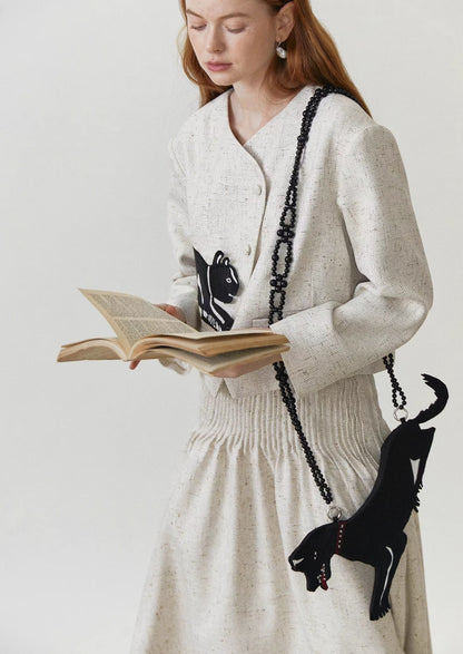 accordion pleated tweed mid-length skirt