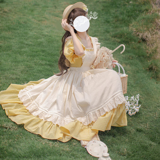 Pale yellow lady retro dress and apron