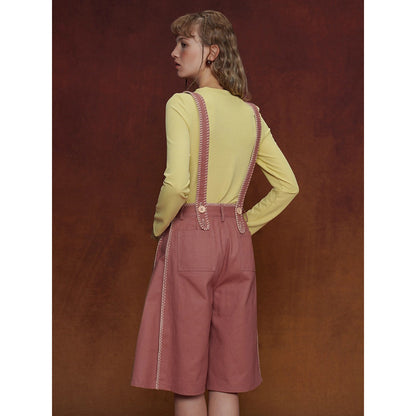 煉瓦色の刺繍ストラップパンツ