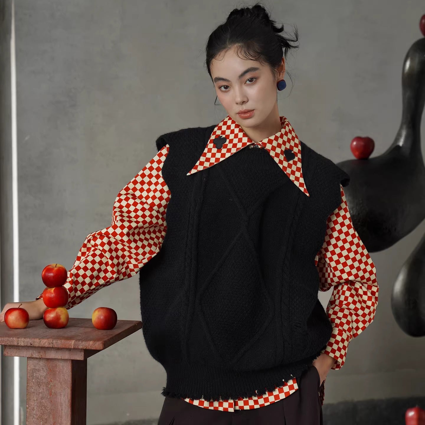 幾何学模様のニットベスト