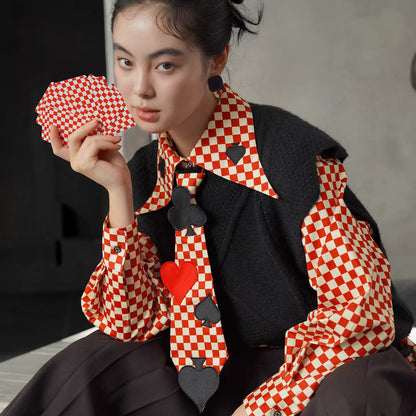 幾何学模様のニットベスト