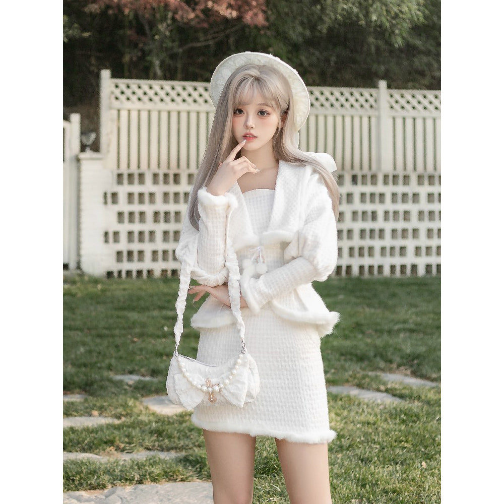 純白の令嬢のツイードジャケットとハーフスカート