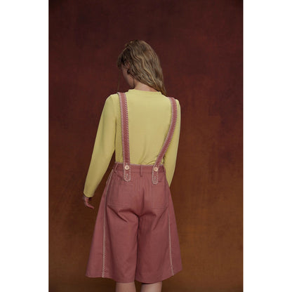 煉瓦色の刺繍ストラップパンツ