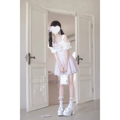 桃色のお嬢様のフリルトップスとコルセットスカート