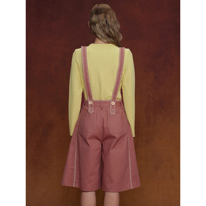 煉瓦色の刺繍ストラップパンツ