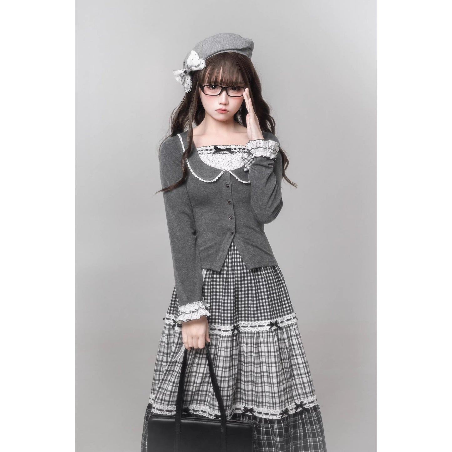 書斎のお嬢様のドッキングトップスとティアードスカート