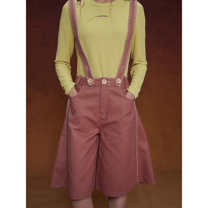 煉瓦色の刺繍ストラップパンツ