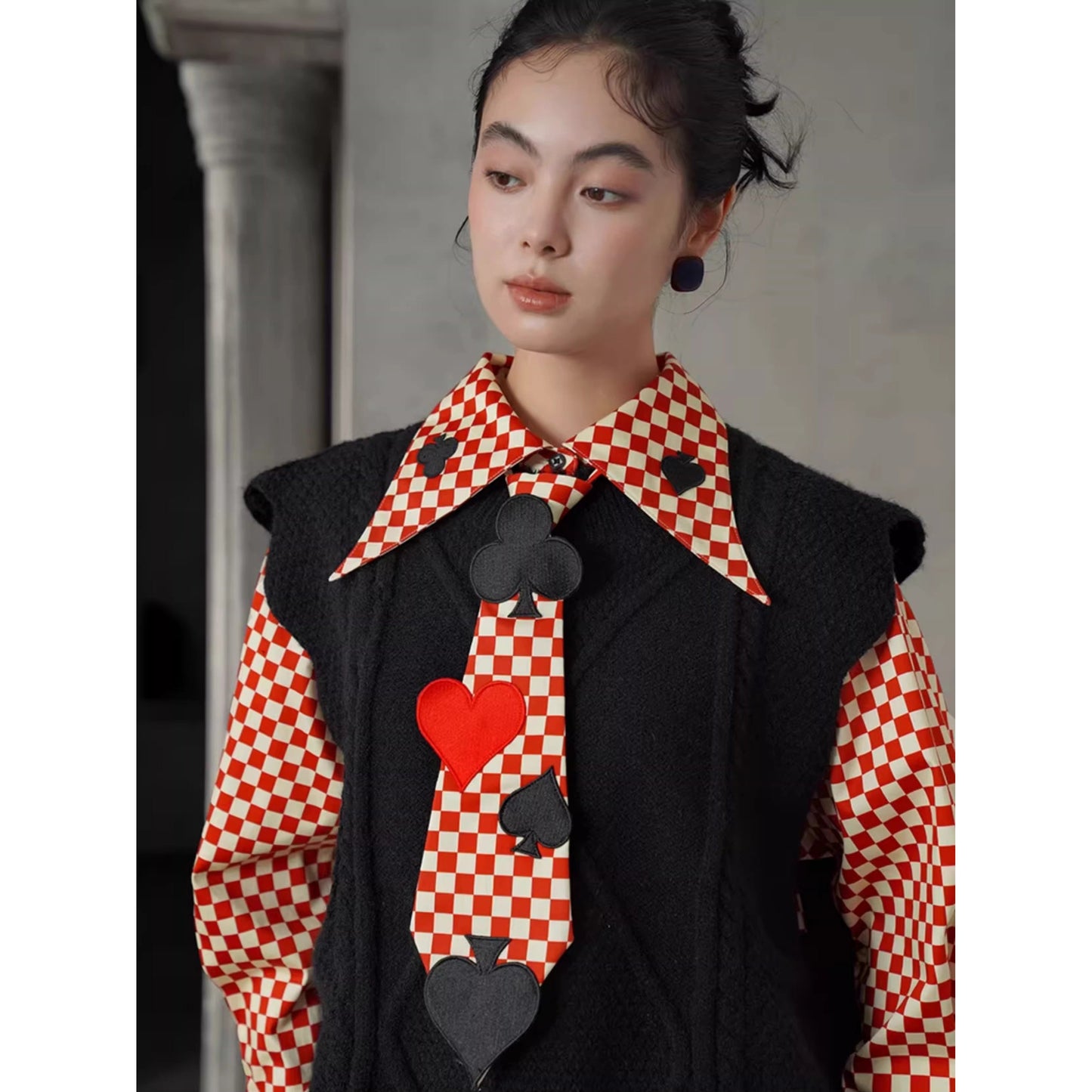 幾何学模様のニットベスト