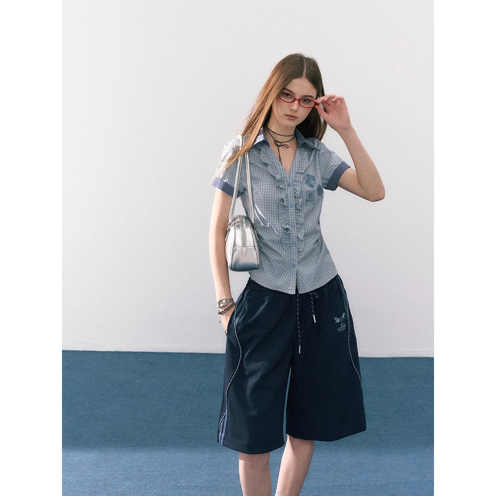 魔法学校のフリルチェックブラウス