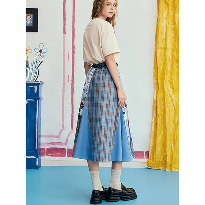 オダリスク、ブルーハーモニーの格子柄スカート