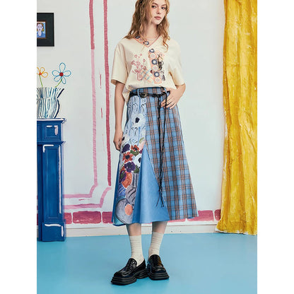 オダリスク、ブルーハーモニーの格子柄スカート