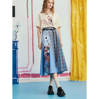 オダリスク、ブルーハーモニーの格子柄スカート