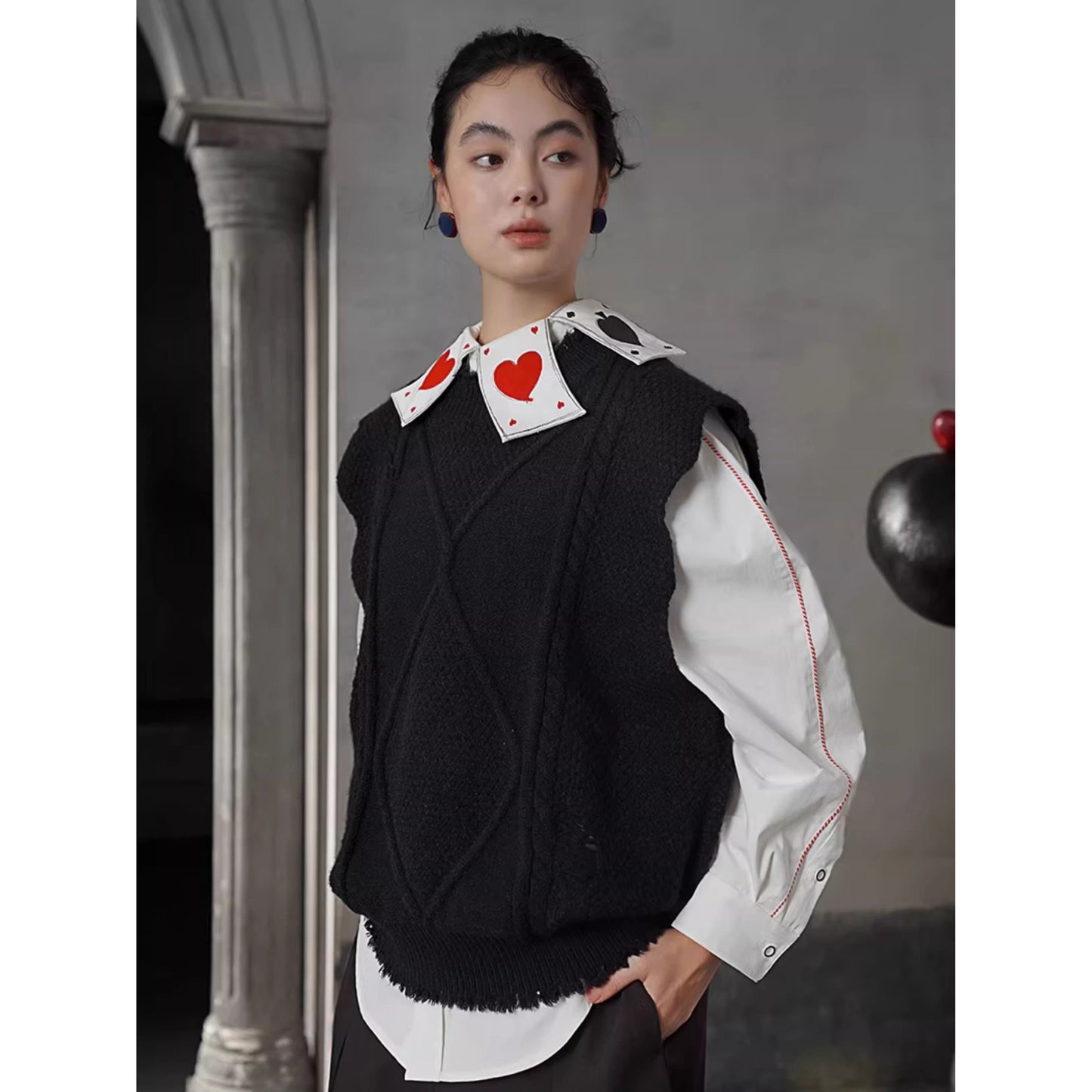 幾何学模様のニットベスト