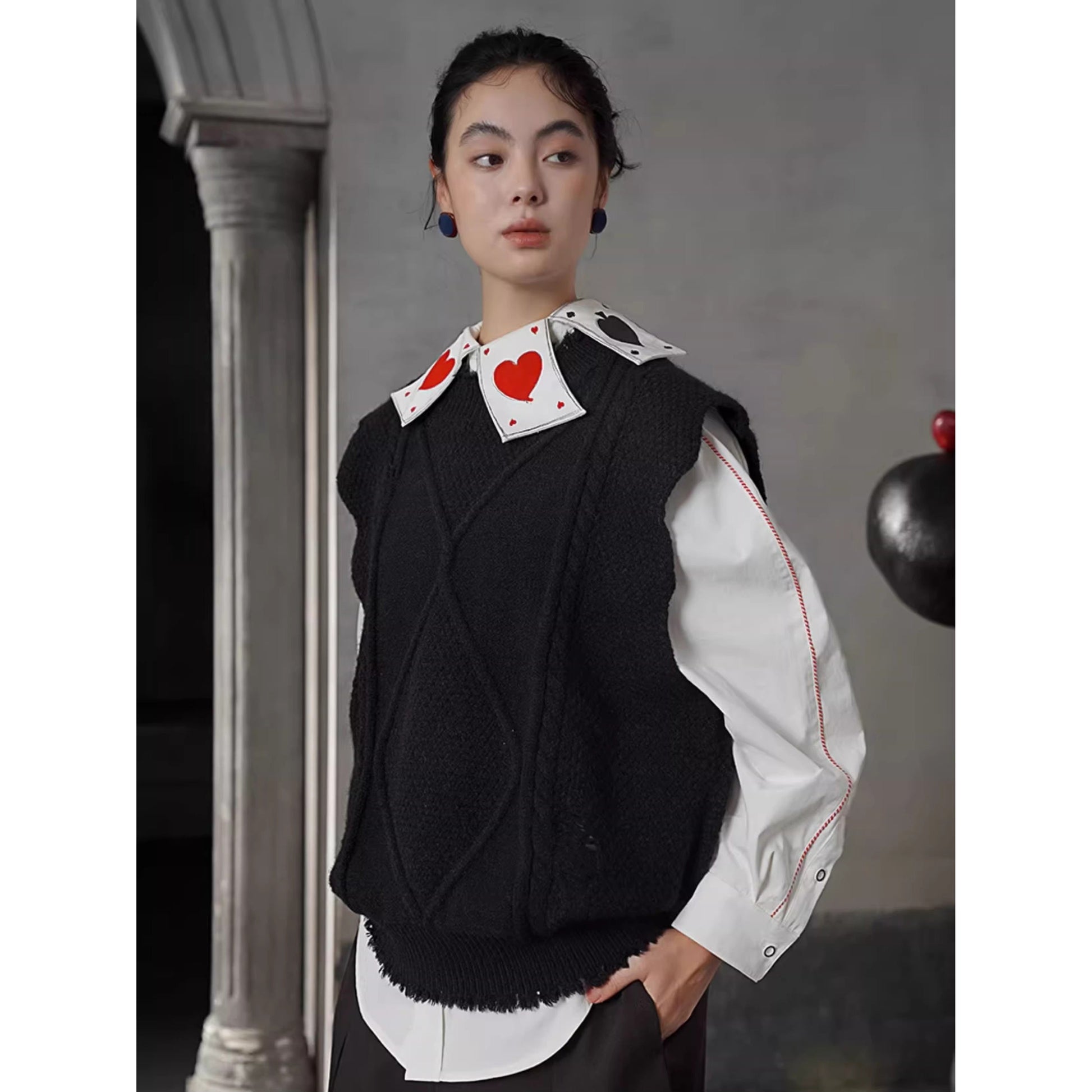 幾何学模様のニットベスト