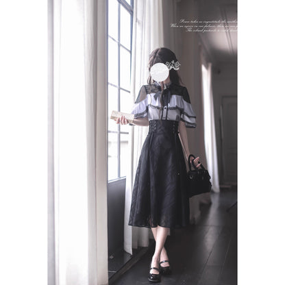 夜会の令嬢のケープトップスとコルセットスカート