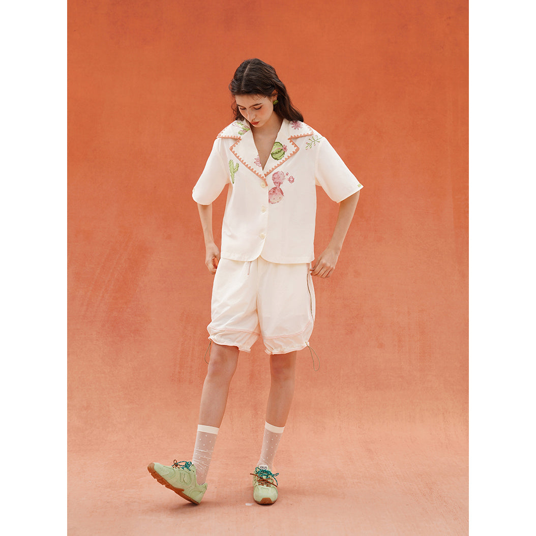 サボテンと花のジップアップハーフパンツ