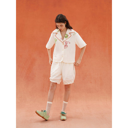 サボテンと花のジップアップハーフパンツ