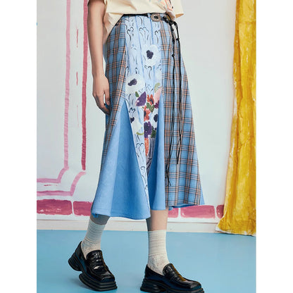 オダリスク、ブルーハーモニーの格子柄スカート