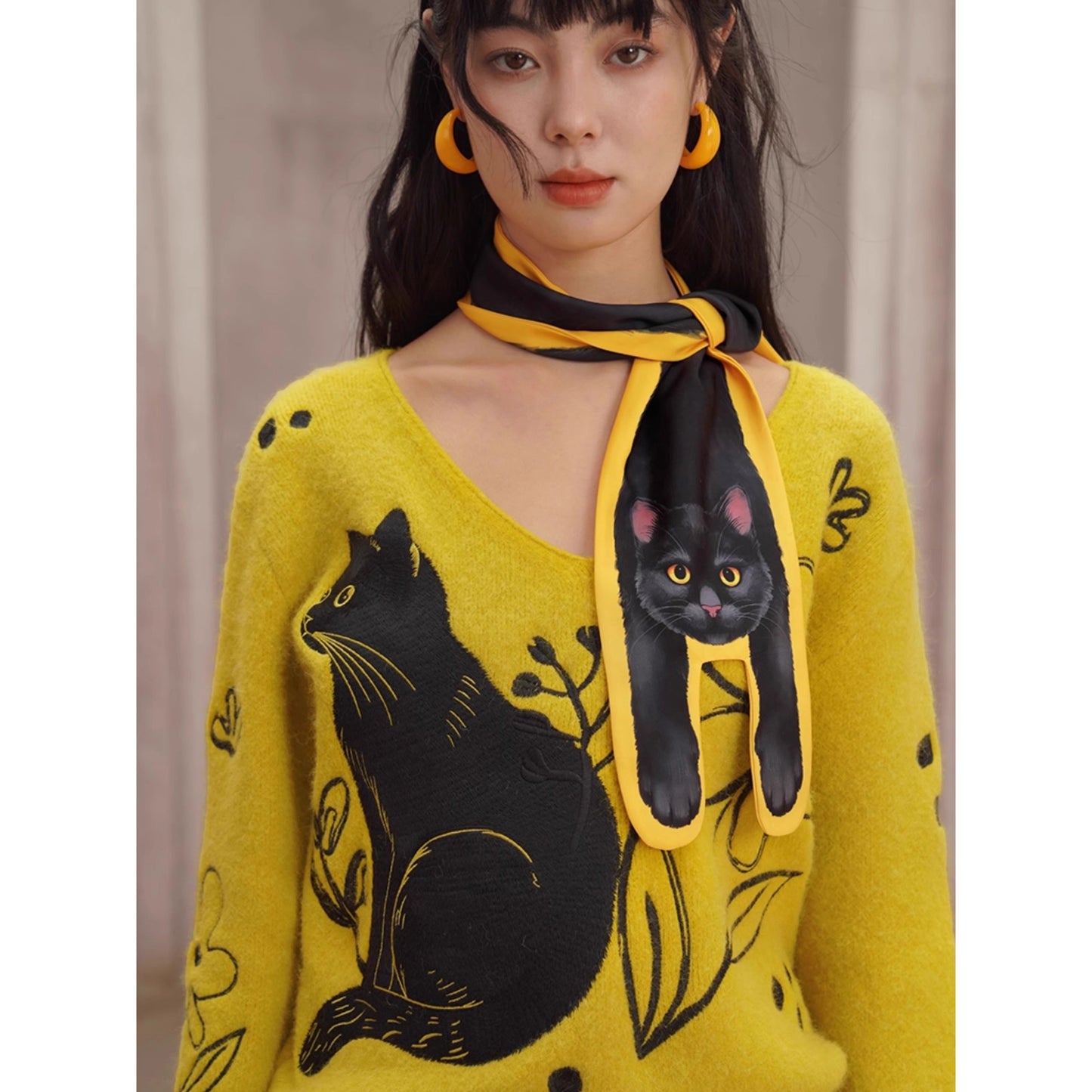 黒猫と花の刺繍ニットセーター