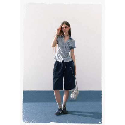 魔法学校のフリルチェックブラウス