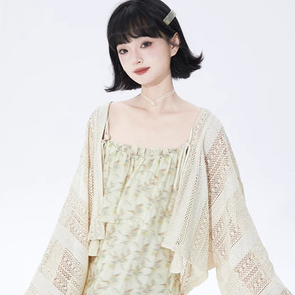 Off-white short knit cardigan in ethnic style