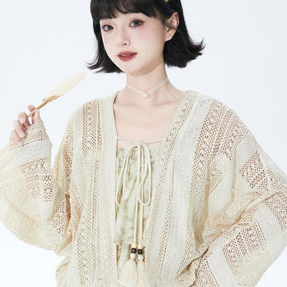 Off-white short knit cardigan in ethnic style