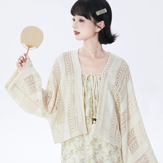 Off-white short knit cardigan in ethnic style