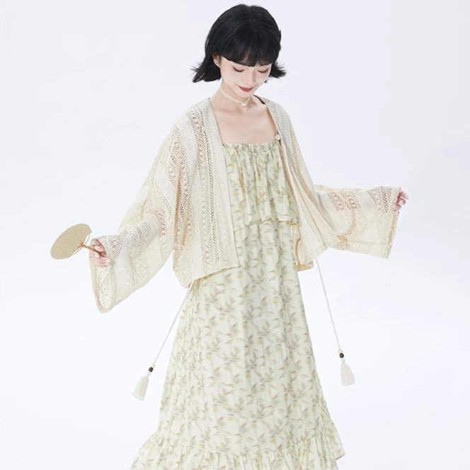 Off-white short knit cardigan in ethnic style