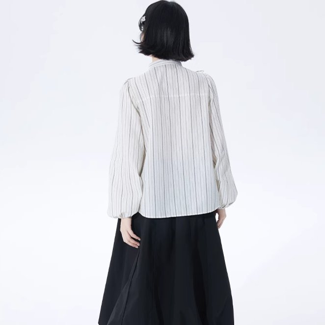 Well-tailored black and white striped long sleeve shirt