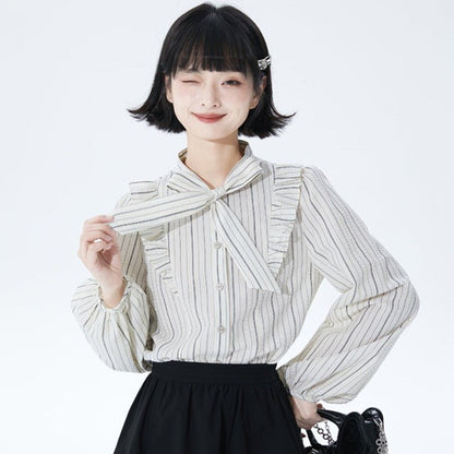 Well-tailored black and white striped long sleeve shirt