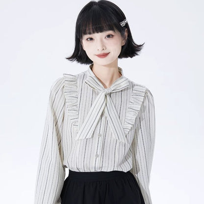 Well-tailored black and white striped long sleeve shirt