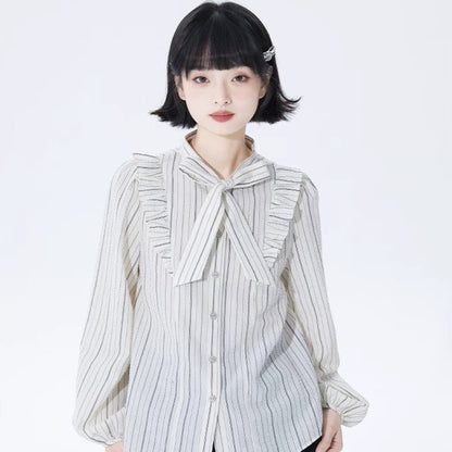 Well-tailored black and white striped long sleeve shirt