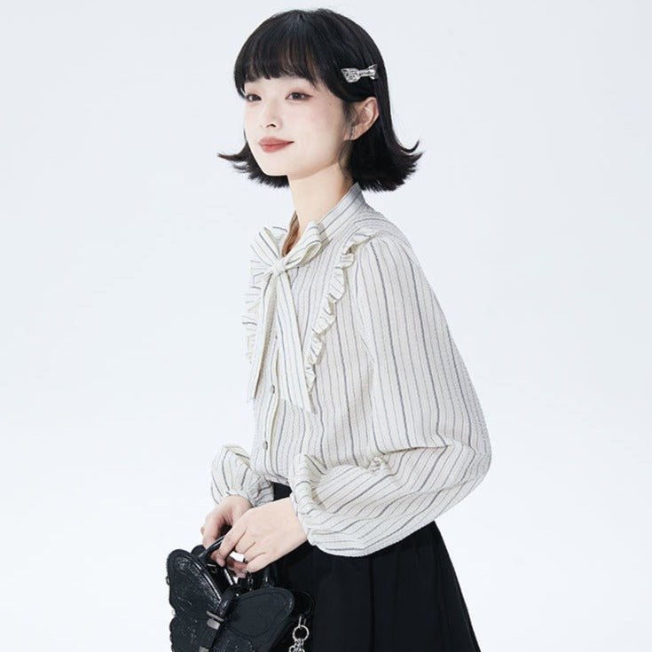 Well-tailored black and white striped long sleeve shirt