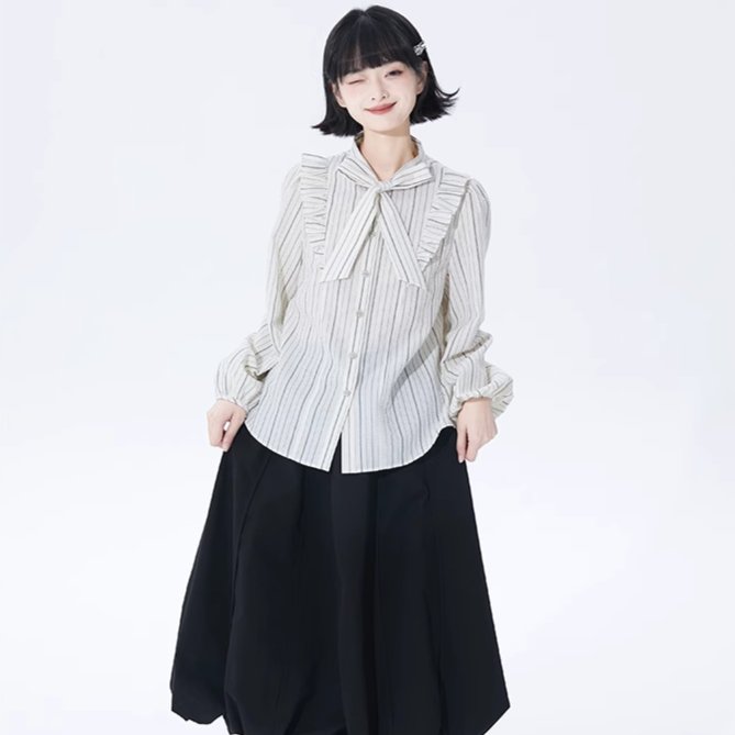 Well-tailored black and white striped long sleeve shirt