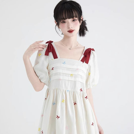Well-tailored bow embroidered square neck Tencel dress