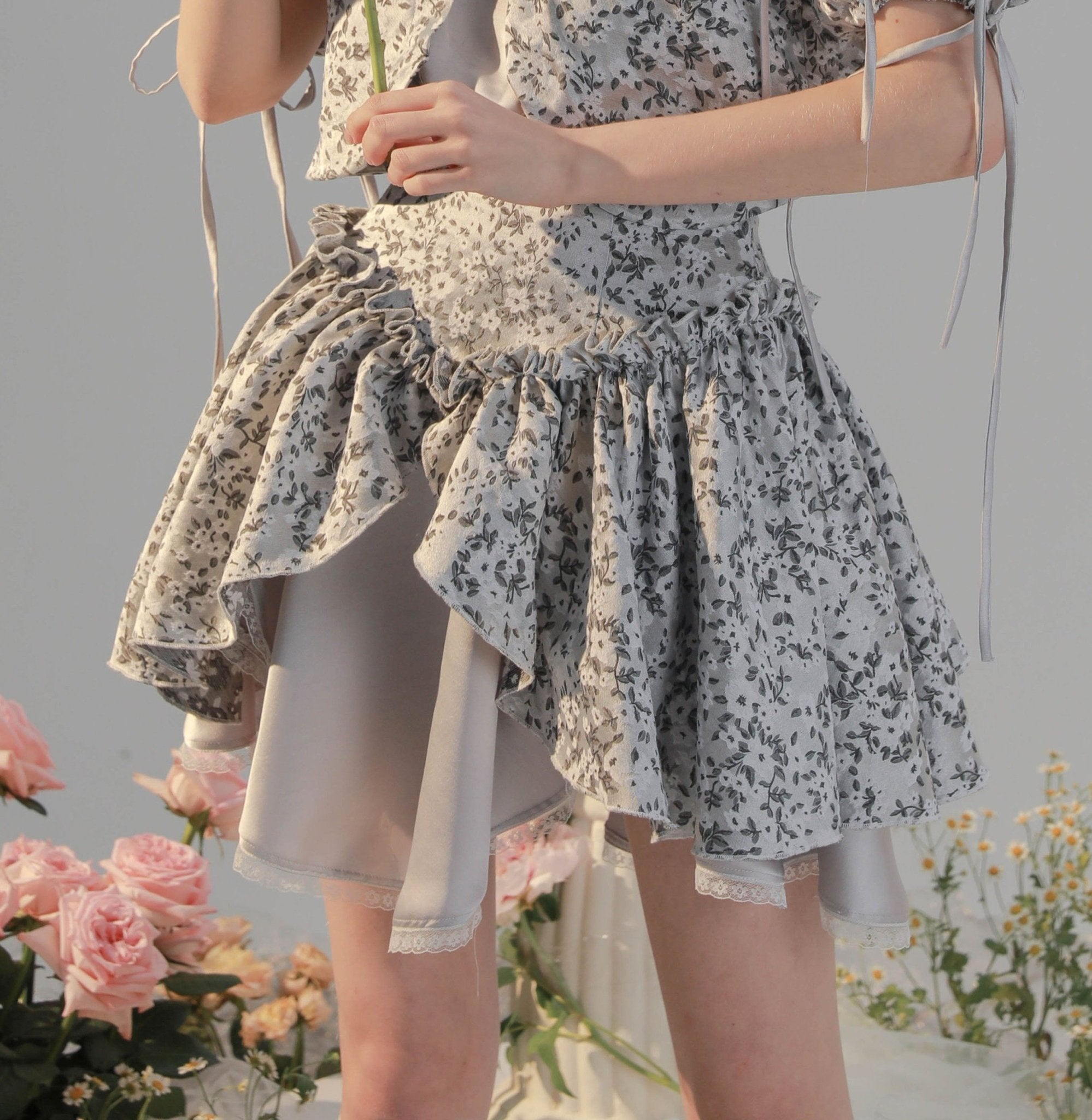 Layered irregular floral mini skirt